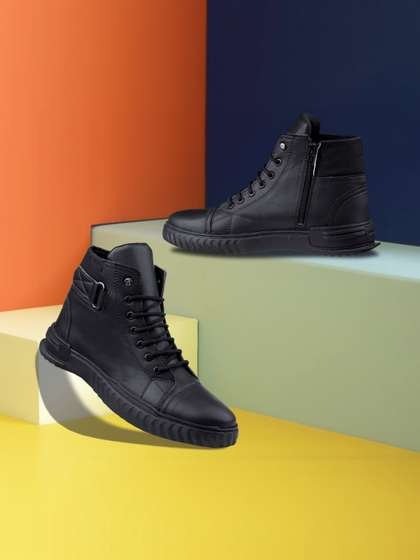 Black boots on colour blocks